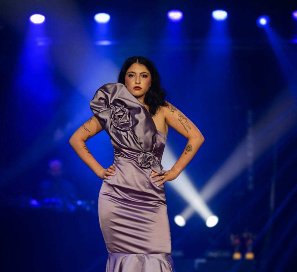 Model on the runway at a fashion show in Cork
