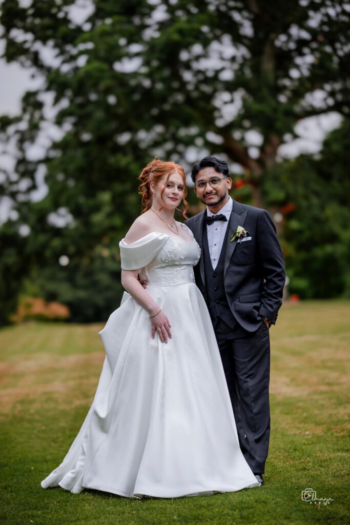 Bride and groom in a garden setting – wedding photography in Cork